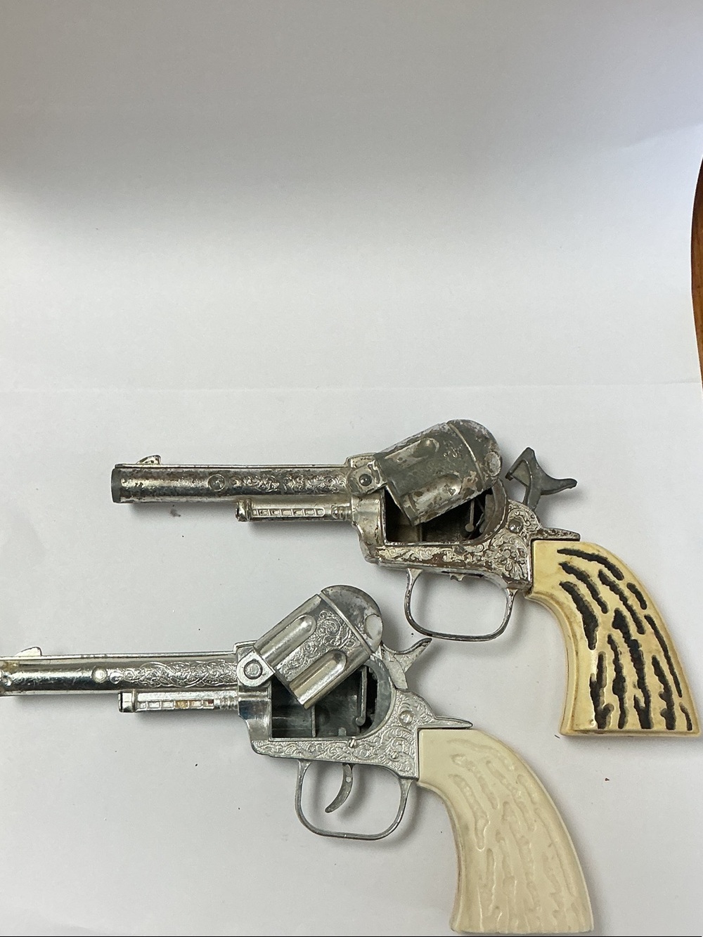Vintage heavy die cast metal Cap Guns Pair with Ivory Handles lot of 2